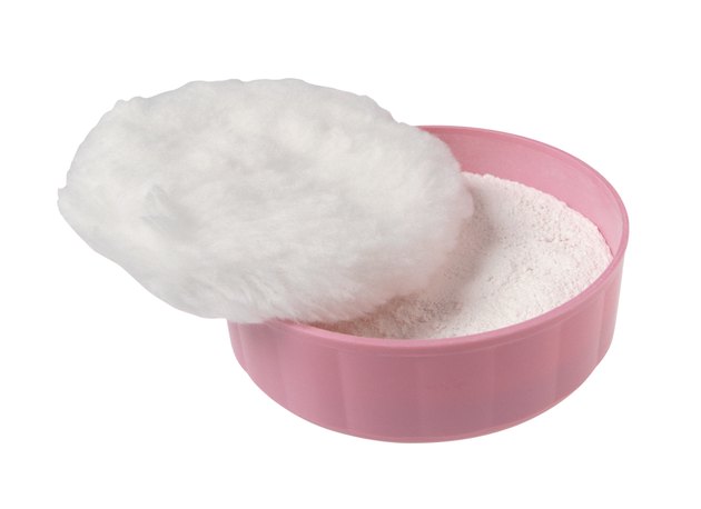 Powder puff and powder in container