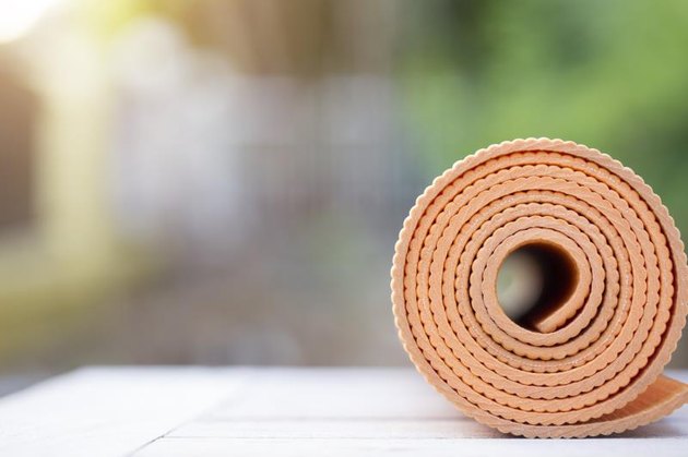yoga mat on the table in a garden