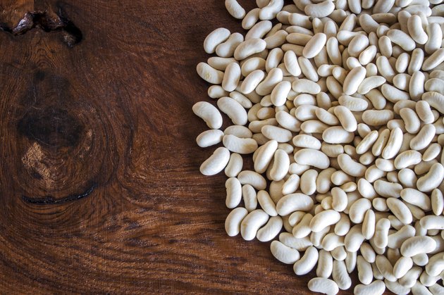 close up bean white seed on wood table