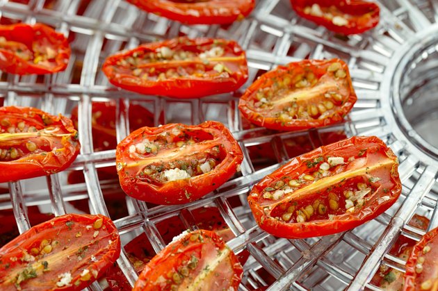 sundried cherry tomatoes on food dehydrator tray