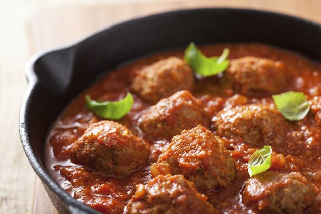 meatballs with tomato sauce in black pan