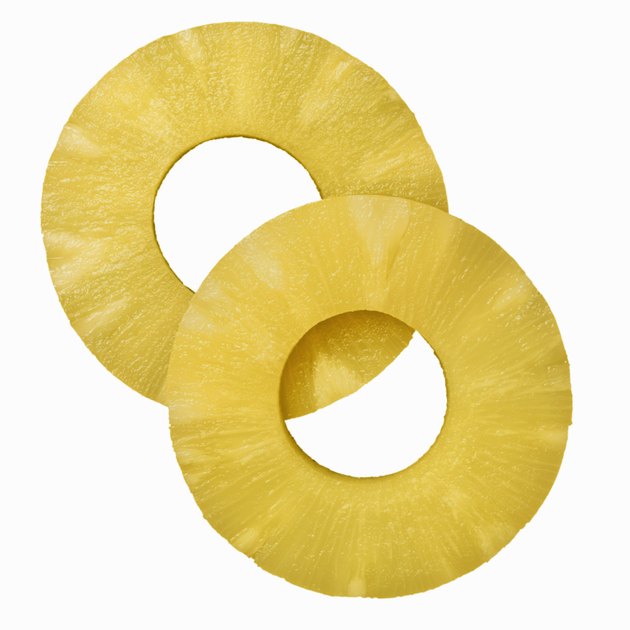 Close-up of two segments of pineapple