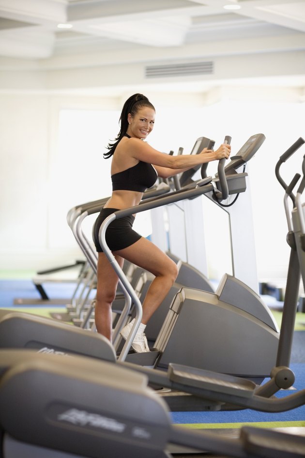 Woman exercising at health club