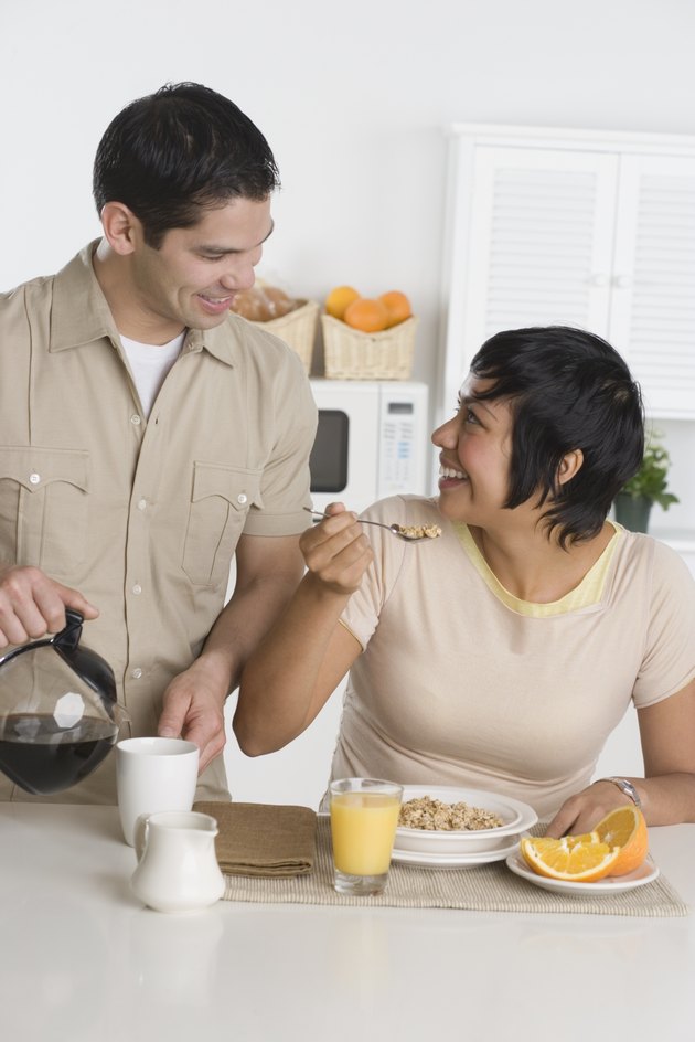 Hispanic couple having breakfast