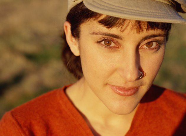 Portrait of Young Woman Wearing Baseball Cap