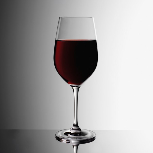 Glass of red wine indoors