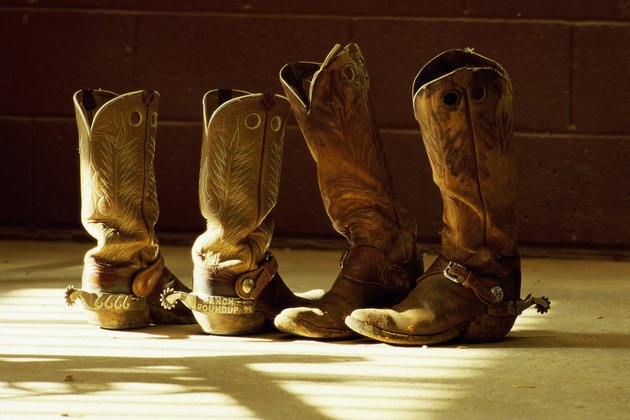 Close-up of two pairs of cowboy boots