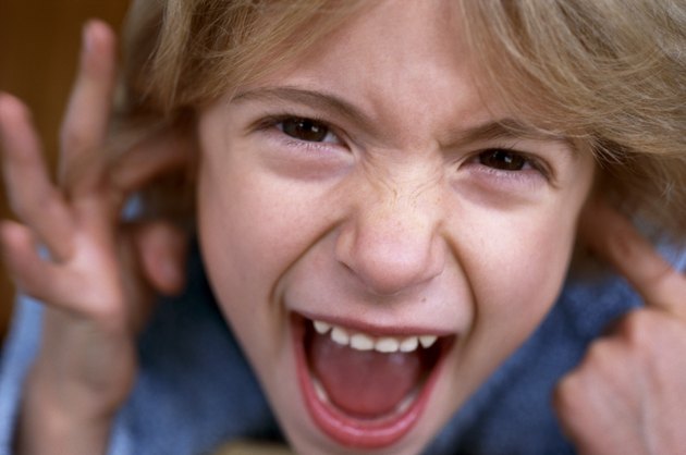 A headshot of a child screaming