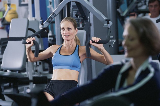 Woman on exercise machine