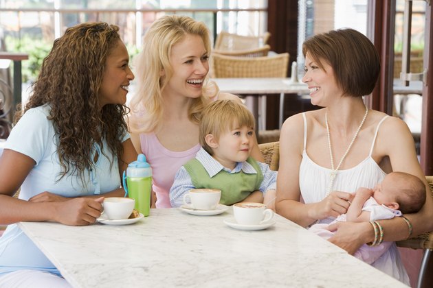 Friends and children in cafe