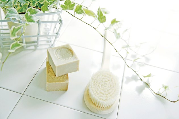Body brush and soap in bathroom