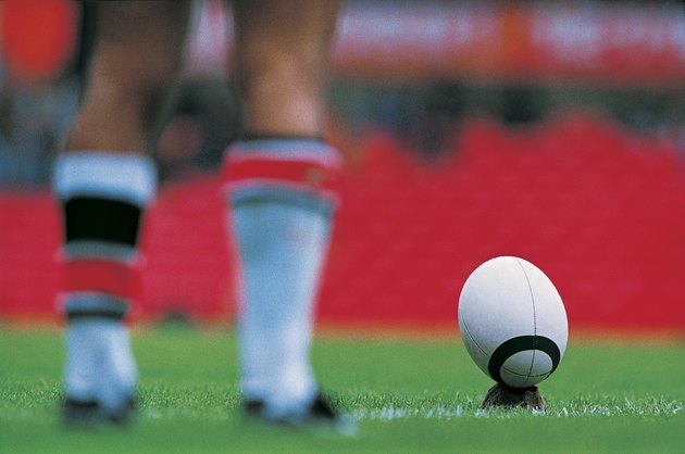 Rugby Player Preparing to Kick Ball