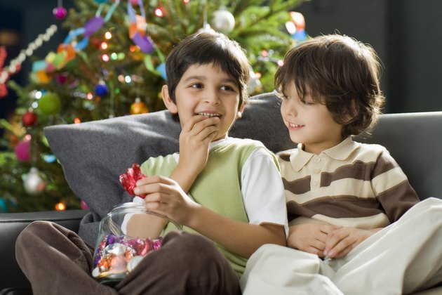 Boys with Christmas candy