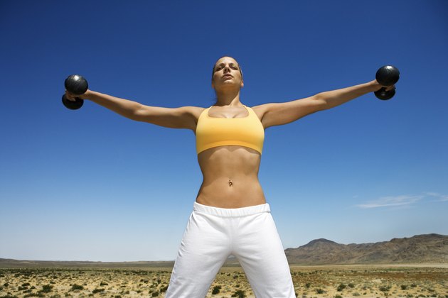 Woman exercising in desert