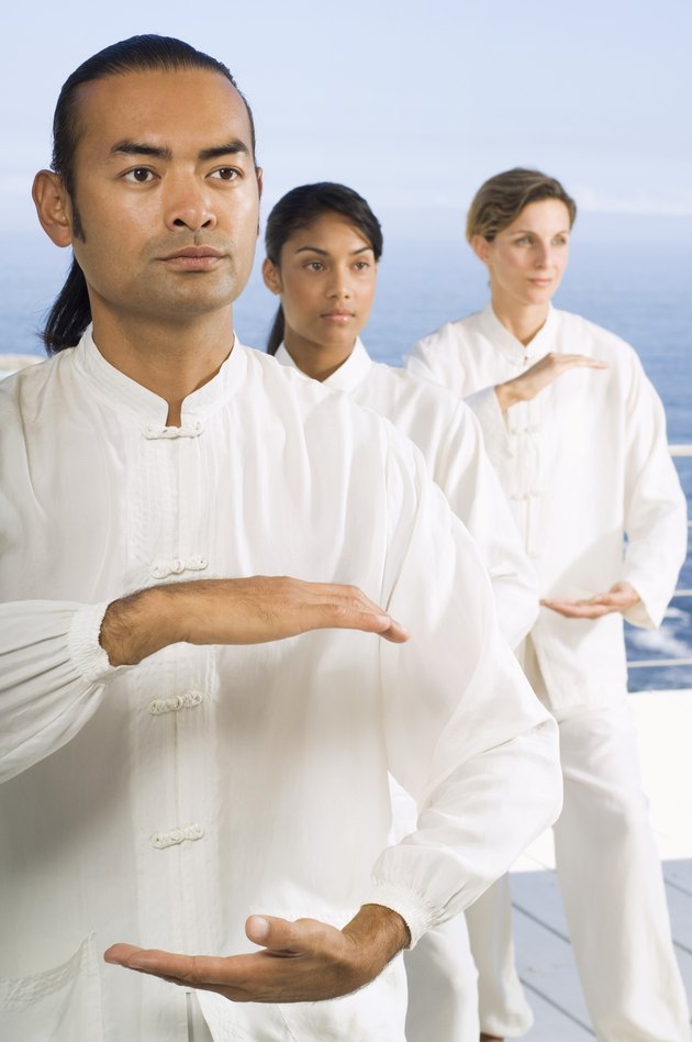 Man and women practicing Tai Chi