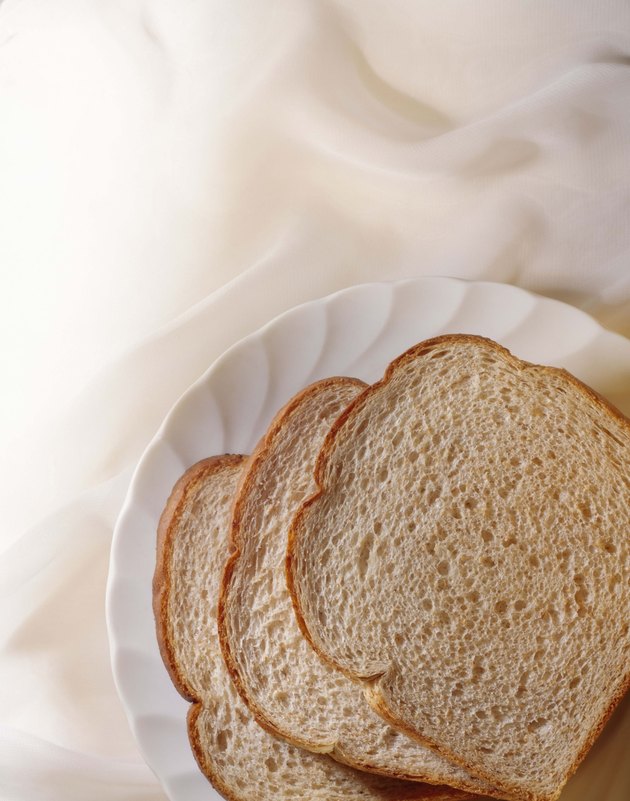 Slices of bread on paper plate