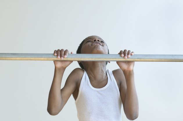 Young boy doing push ups