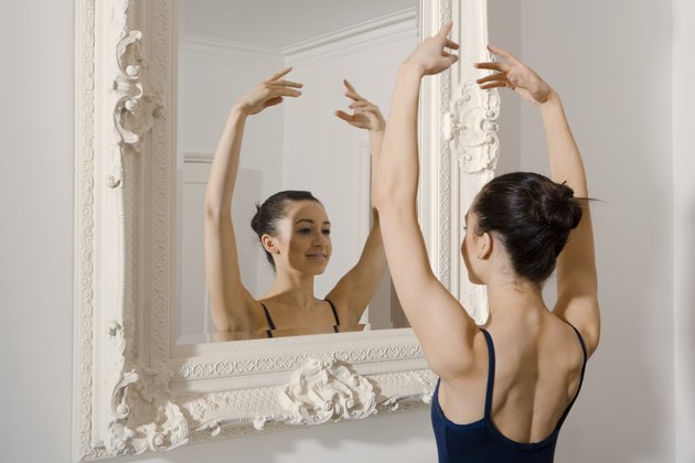 Ballerina posing in mirror
