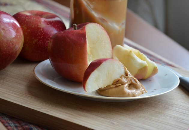 Apples Slices Dipped in Peanut Butter