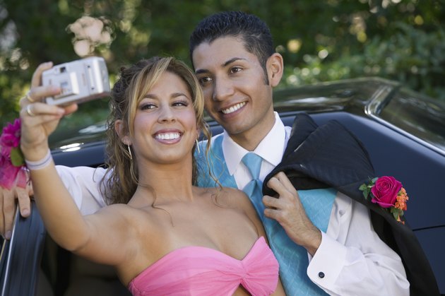 Teenage Girl Snapping Photo at Prom