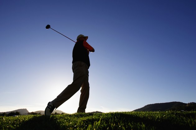 Male golfer, low angle view
