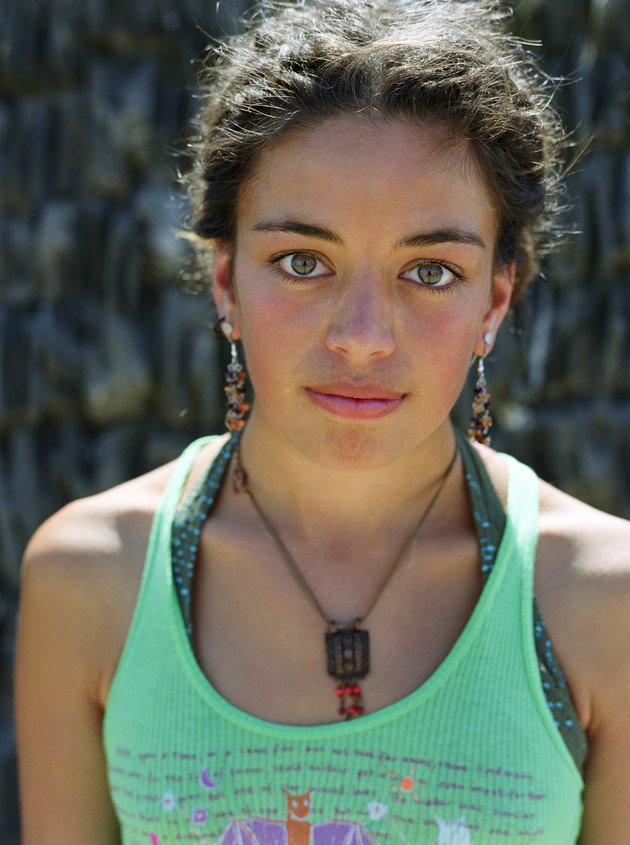 Young woman wearing vest top, portrait, close-up