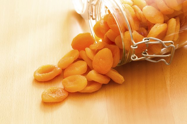 Diet. Glass jar of apricots dried fruits.