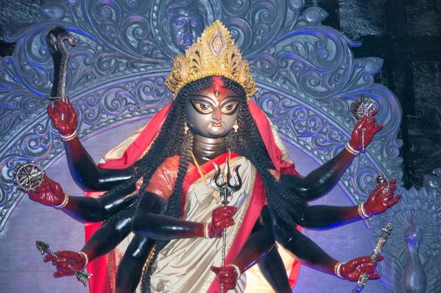 An idol of hindu god kali crafted out of clay shot during a festival in calcutta,india.
