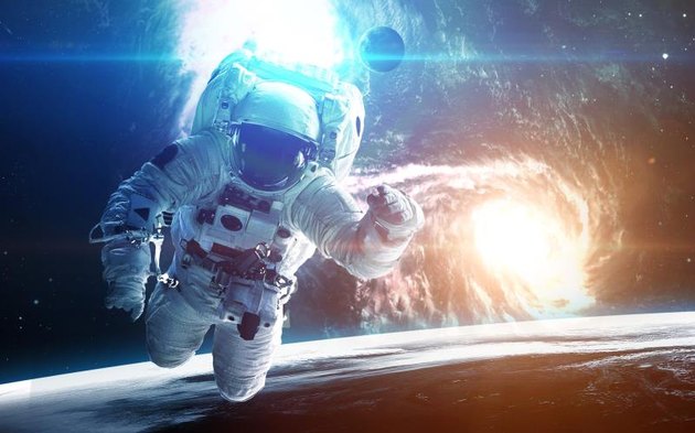Astronaut in outer space. Elements of this image furnished by NASA.