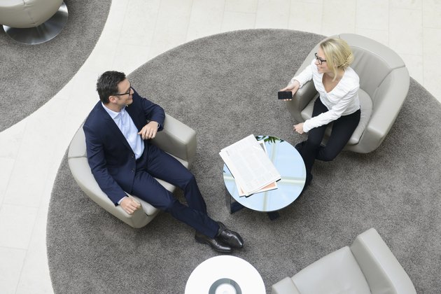 Business people meeting in lobby