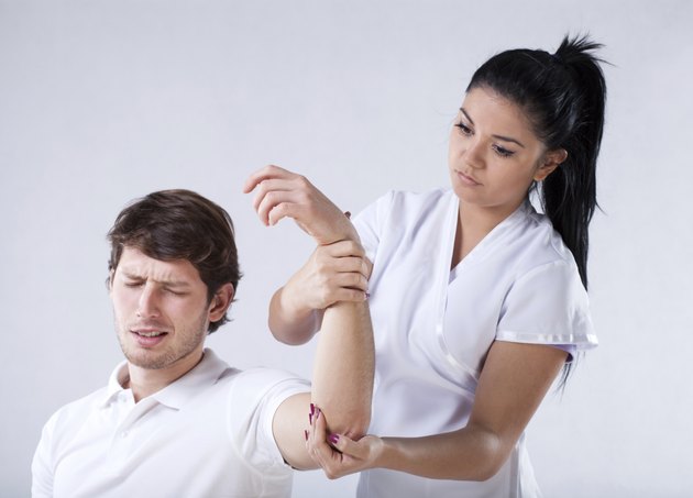 Physiotherapist with patient