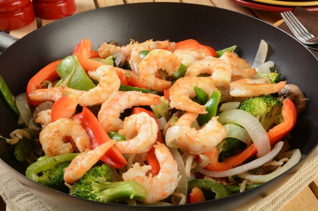Shrimp stir fry in a wok