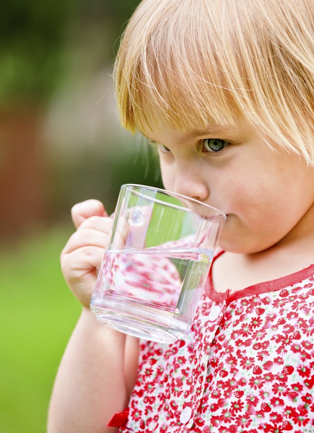 Child with cup of water