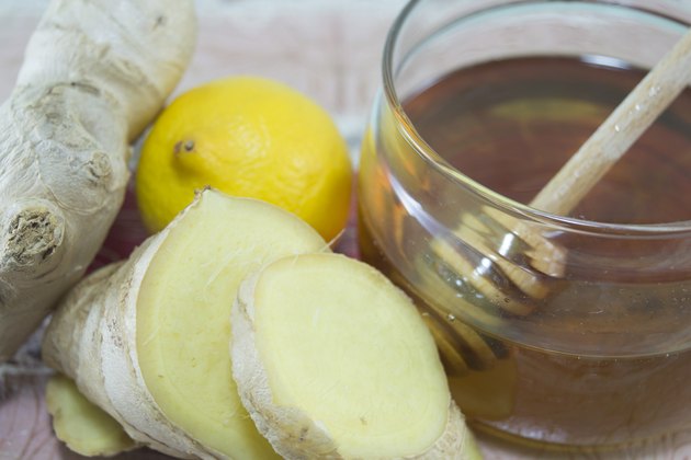 Ginger root, honey and lemon. Healthy food background
