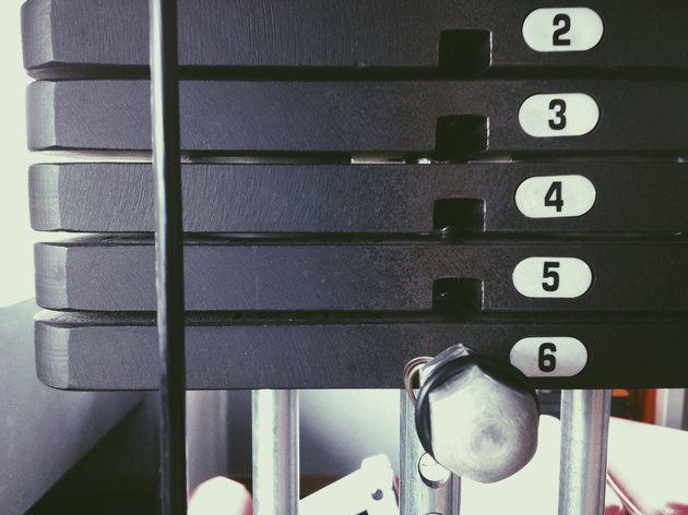 Stack of metal weights in gym.