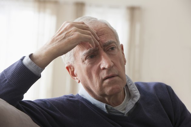 Senior man with headache