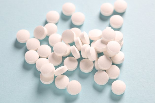 Pills on blue background