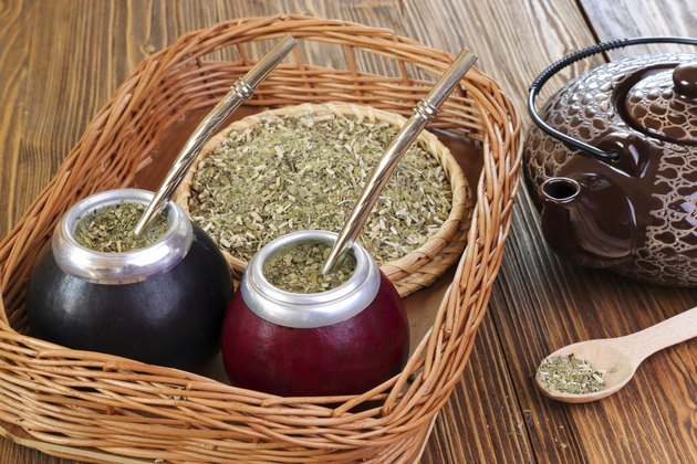 Yerba and mate in calabash on a wicker tray