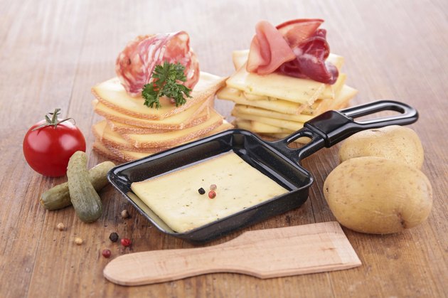raclette on wood background