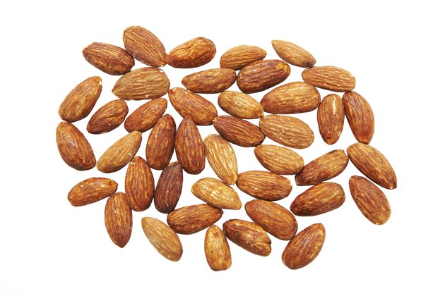 Almonds on white background