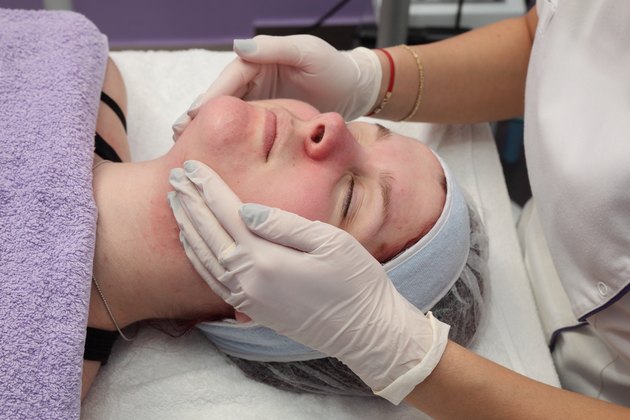Beauty treatment of young female face