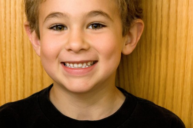 Boy with toothy smile.