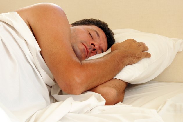 Man sleeping in bed