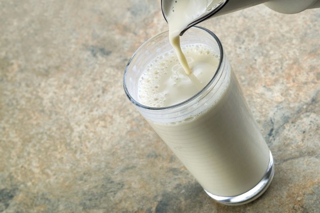 Almond Milk being Poured into Glass