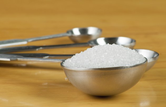 Measuring spoon full of sugar