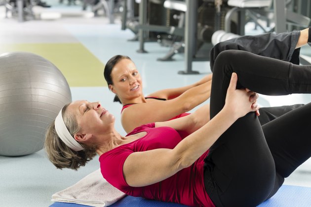Fitness center senior woman exercise gym workout