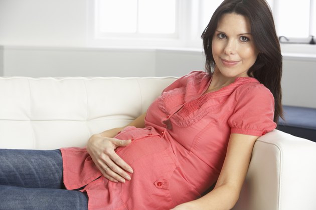 Pregnant Woman Relaxing At Home