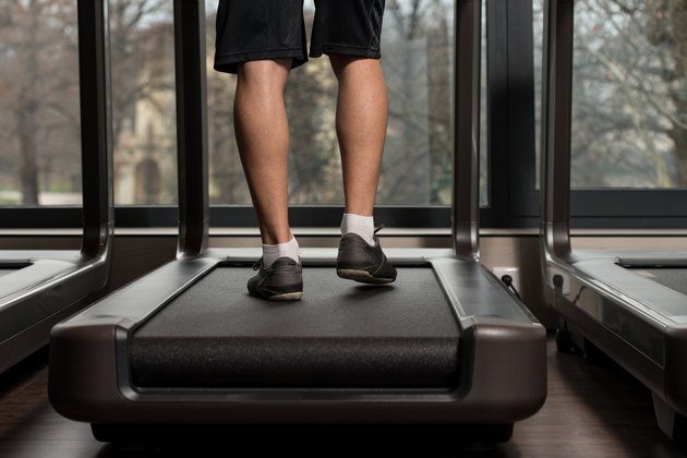 Man Feet On Treadmill