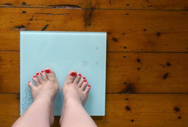 Woman weighing hersel