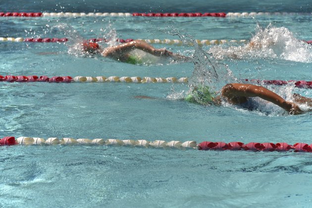 Two female freestyle swimmers